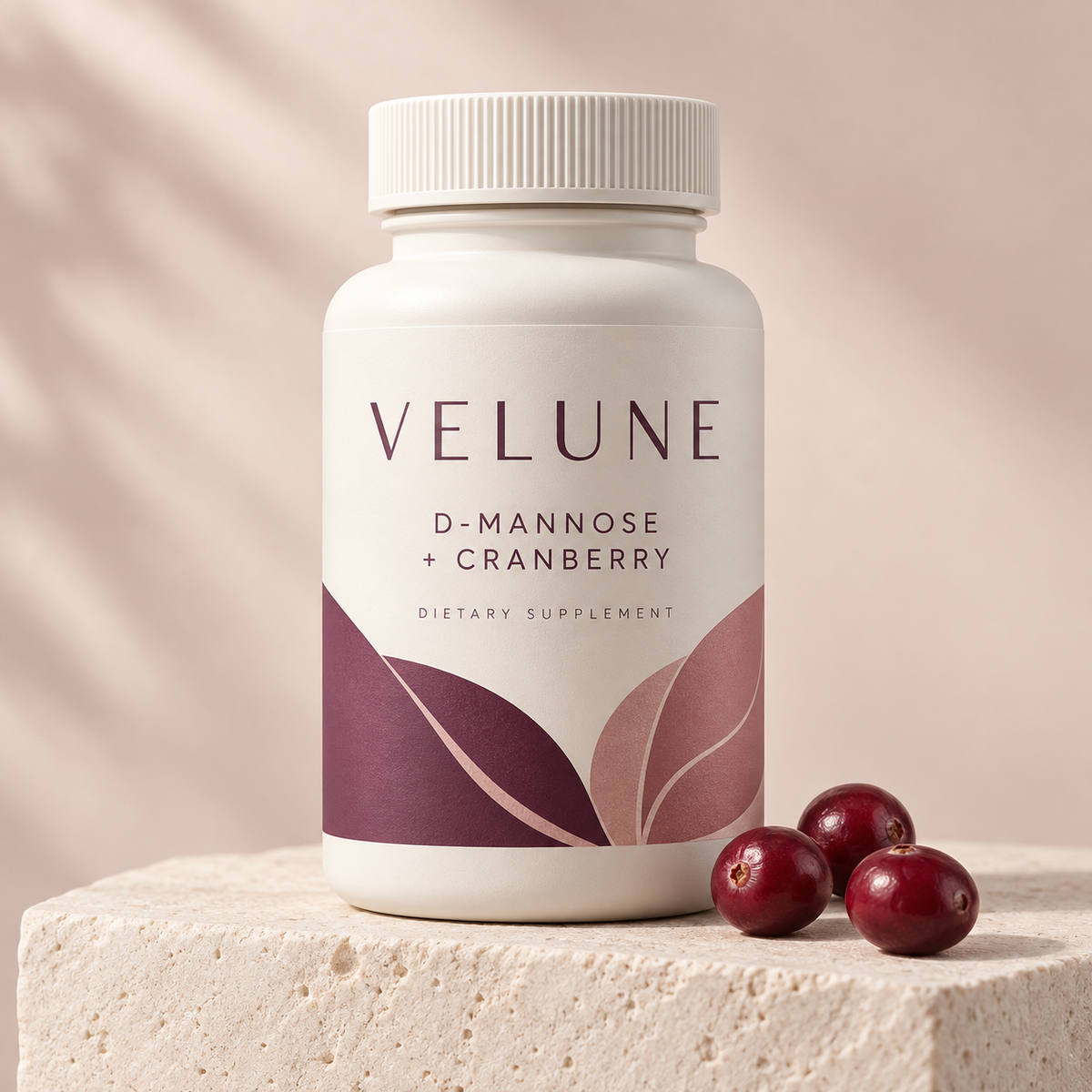 VELUNE D-Mannose + Cranberry cream botanical bottle with ruby red cranberries